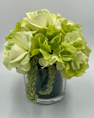 green roses and hydrangea vase