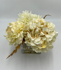 Variety vase of mixed neutral flowers