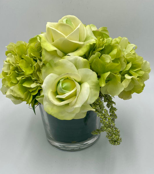 green roses and hydrangea vase