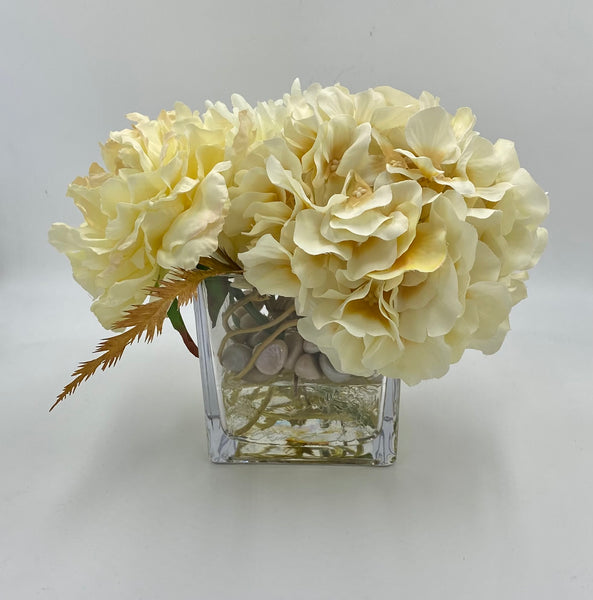 Variety vase of mixed neutral flowers