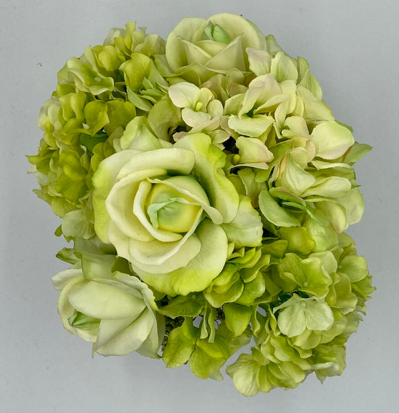 green roses and hydrangea vase